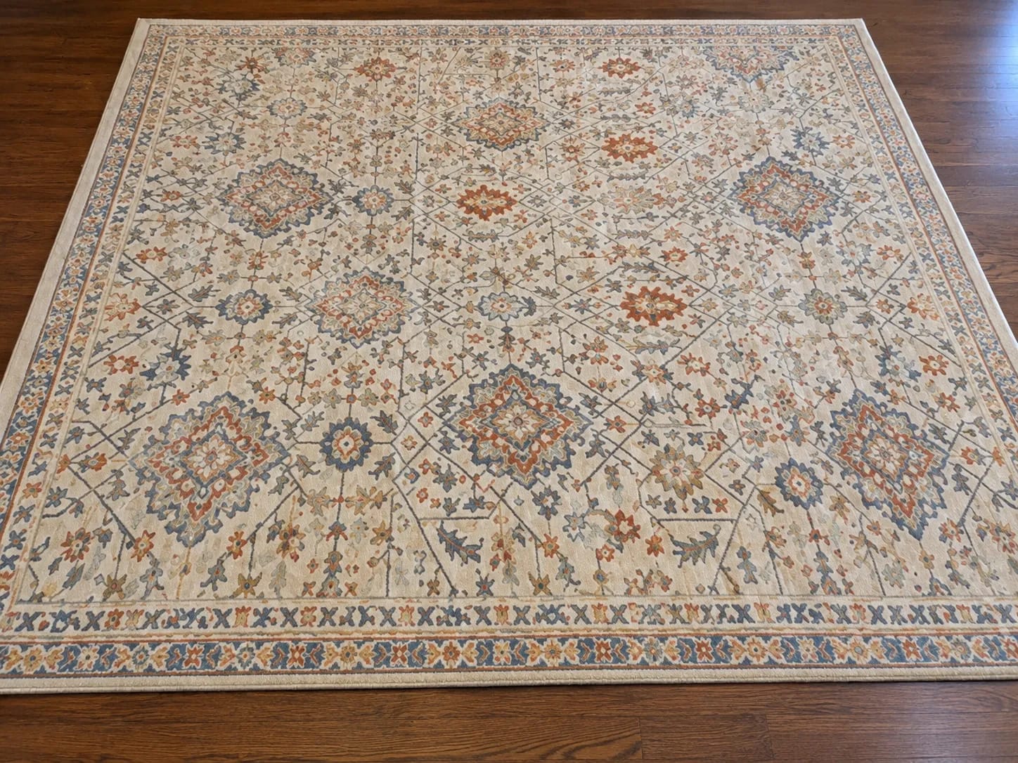 After — patterned area rug cleaned, colors bright and even
