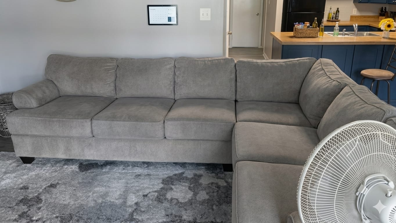 After — the same gray sectional cleaned